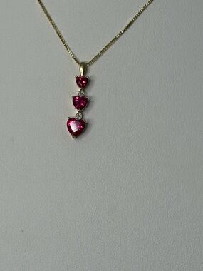 10K yellow gold and 3 Ruby pendant and sterling silver chain
